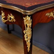 Rosewood, mahogany, and rosewood desk-table, Louis XV style – early 20th century.