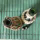 Glass bottles and woven rattan