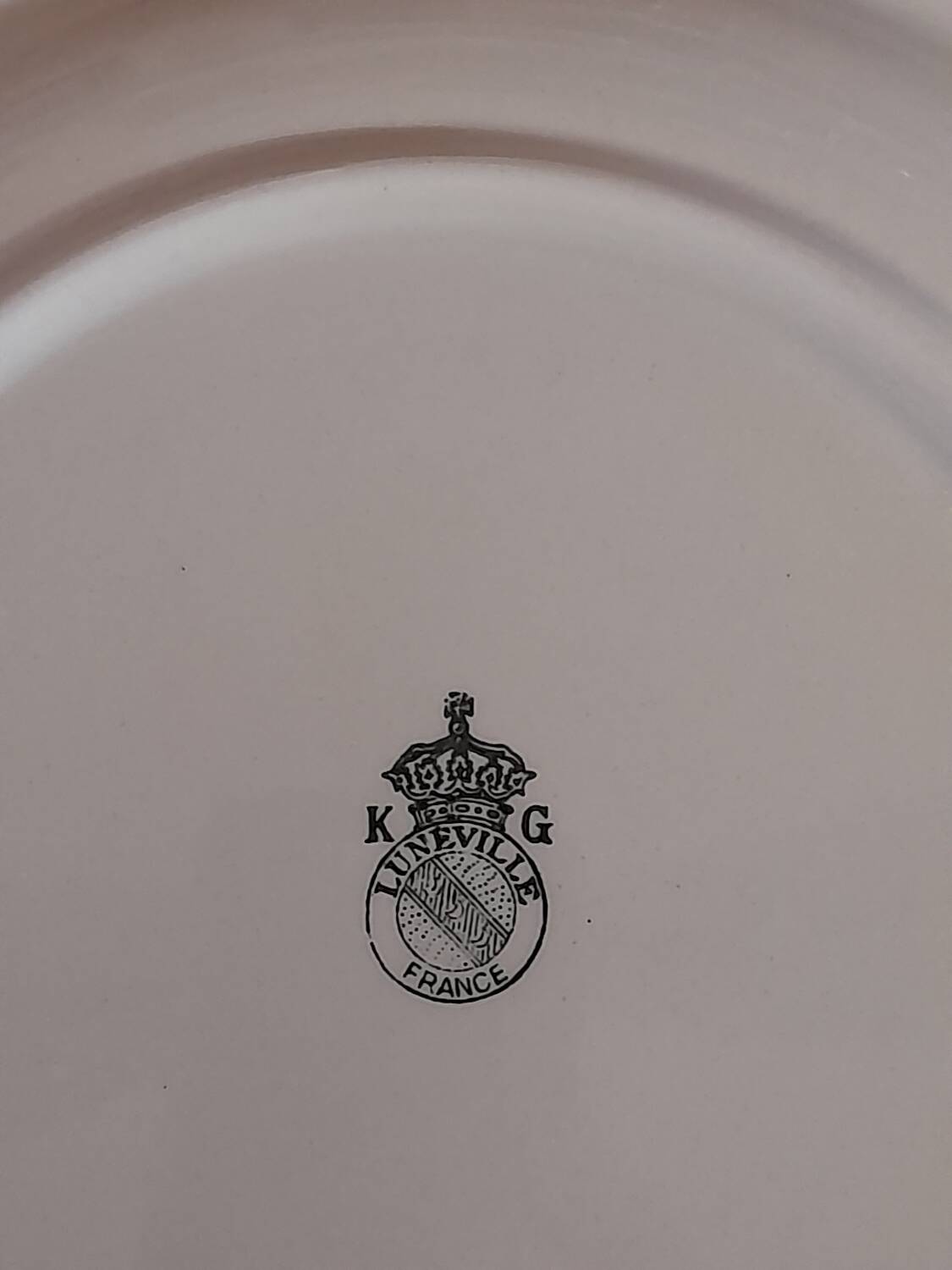 7 Lunéville porcelain plates