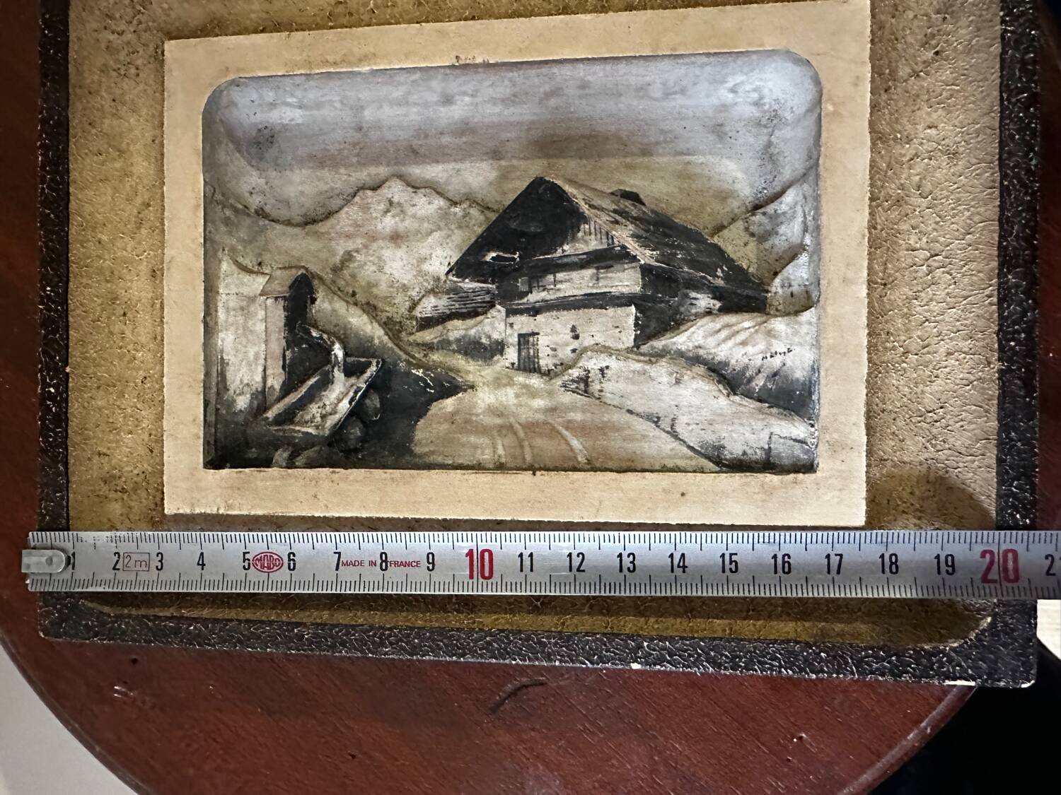 Carved and painted alpine tableau