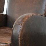 Set of two vintage sheepskin leather design armchairs in a cognac colour