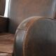 Set of two vintage sheepskin leather design armchairs in a cognac colour