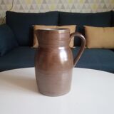 Vintage pitcher in glazed sandstone