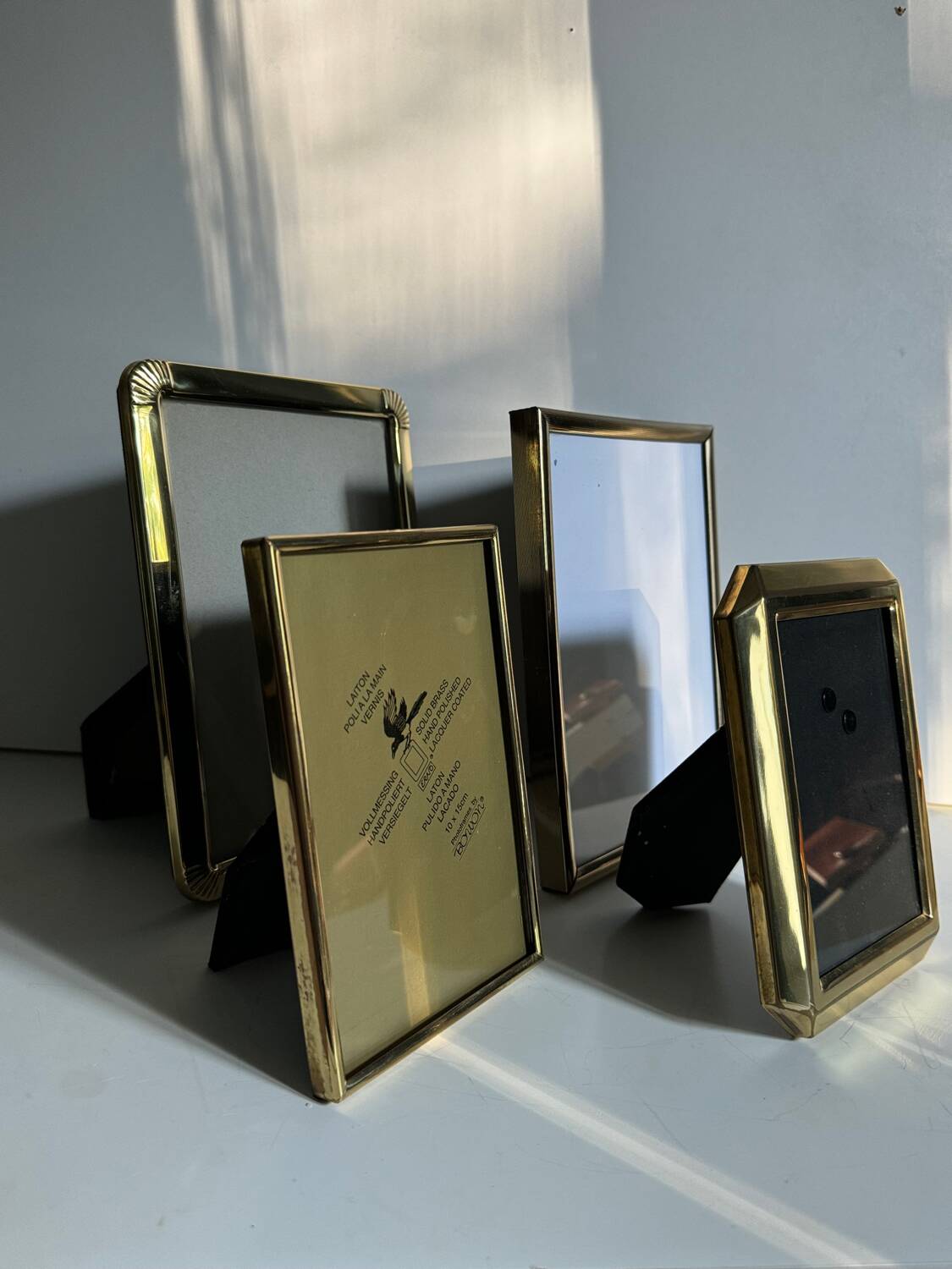 Set of 4 antique brass frames