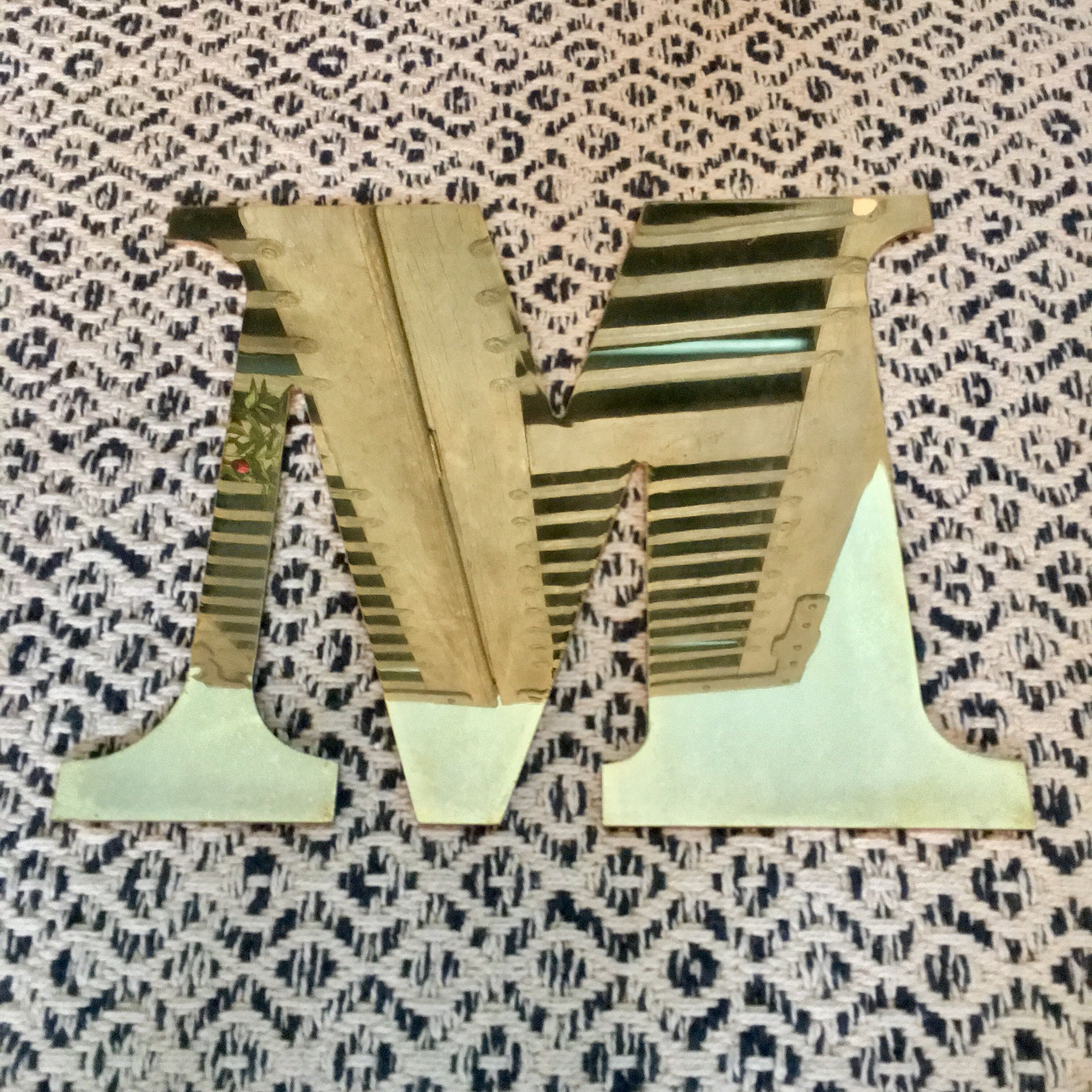 Old store brass sign letter