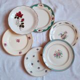 7 mismatched antique dessert plates accompanied by a pie dish
