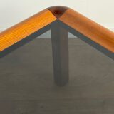 Square wooden coffee table with glass.