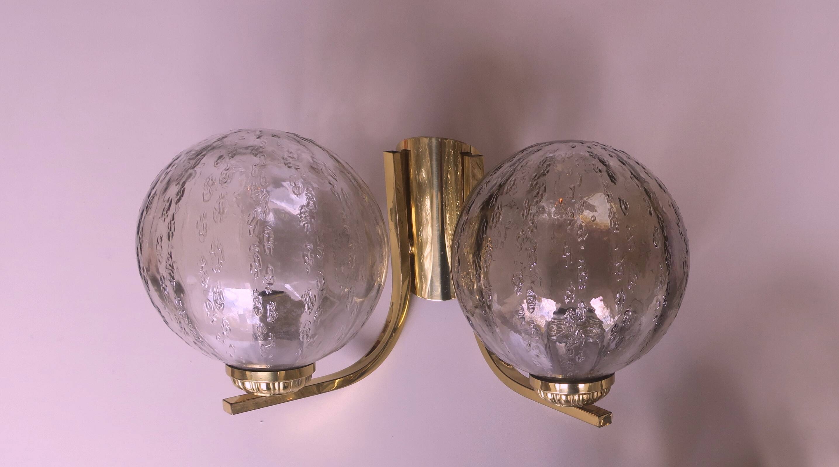 Mid century pair of brass and glass double wall lights, 1970s