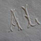 Pair of AL monogrammed pillowcases