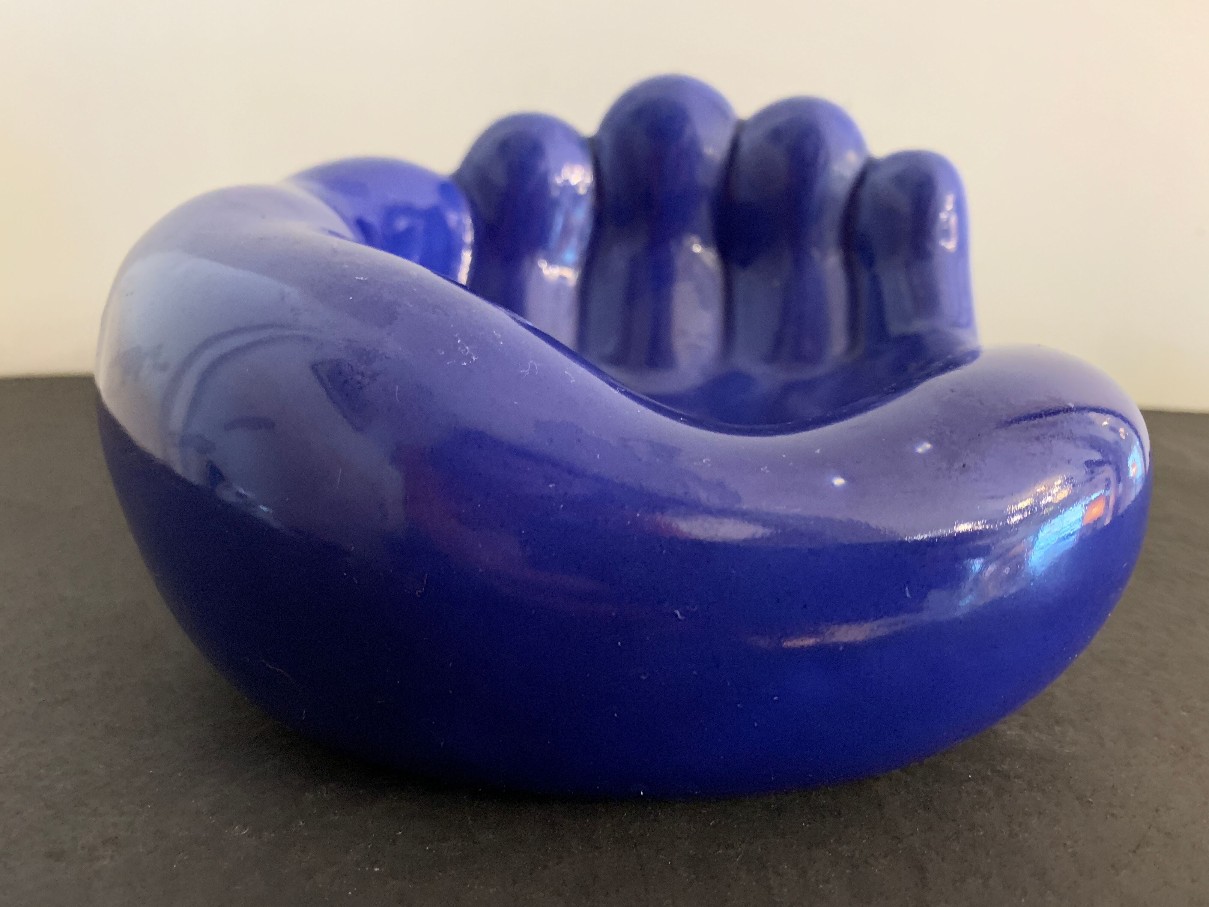Ceramic ashtray, blue hand shape