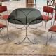 Dining room table + 4 stainless steel and smoked glass chairs 1970