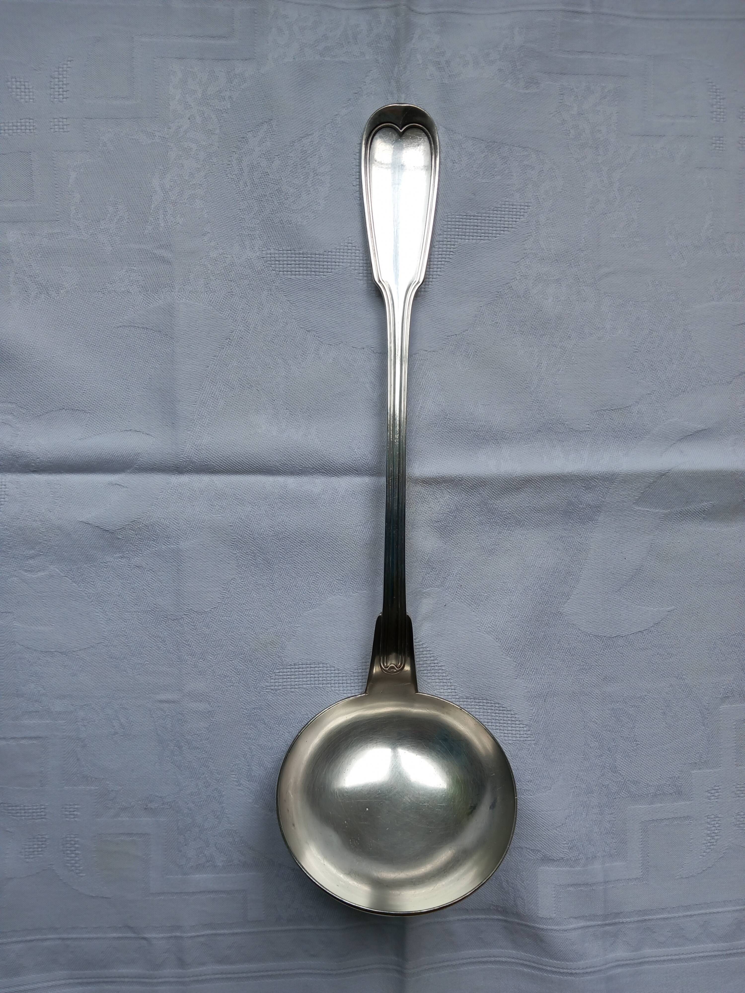 Silver metal ladle