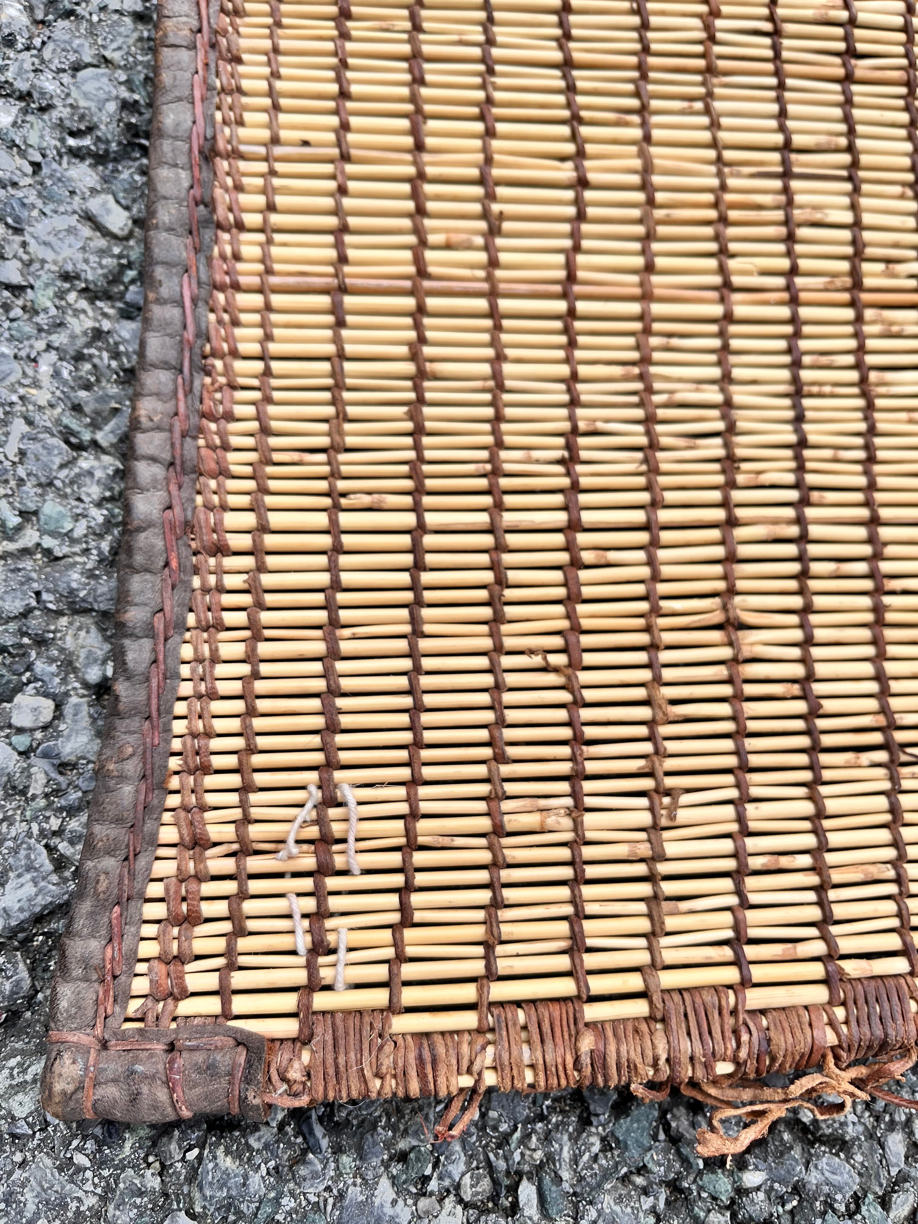 Mauritanian African mat in leather and reeds