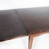 Dining table in rosewood with extension, of Danish design by Ellegaards Furniture, 1960s