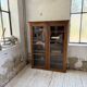 Glass-fronted walnut library 1900