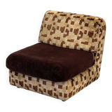 Vintage armchair from the 70s in beige and brown.