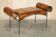 Vintage Spanish window bench in hand-stitched leather and restored iron.