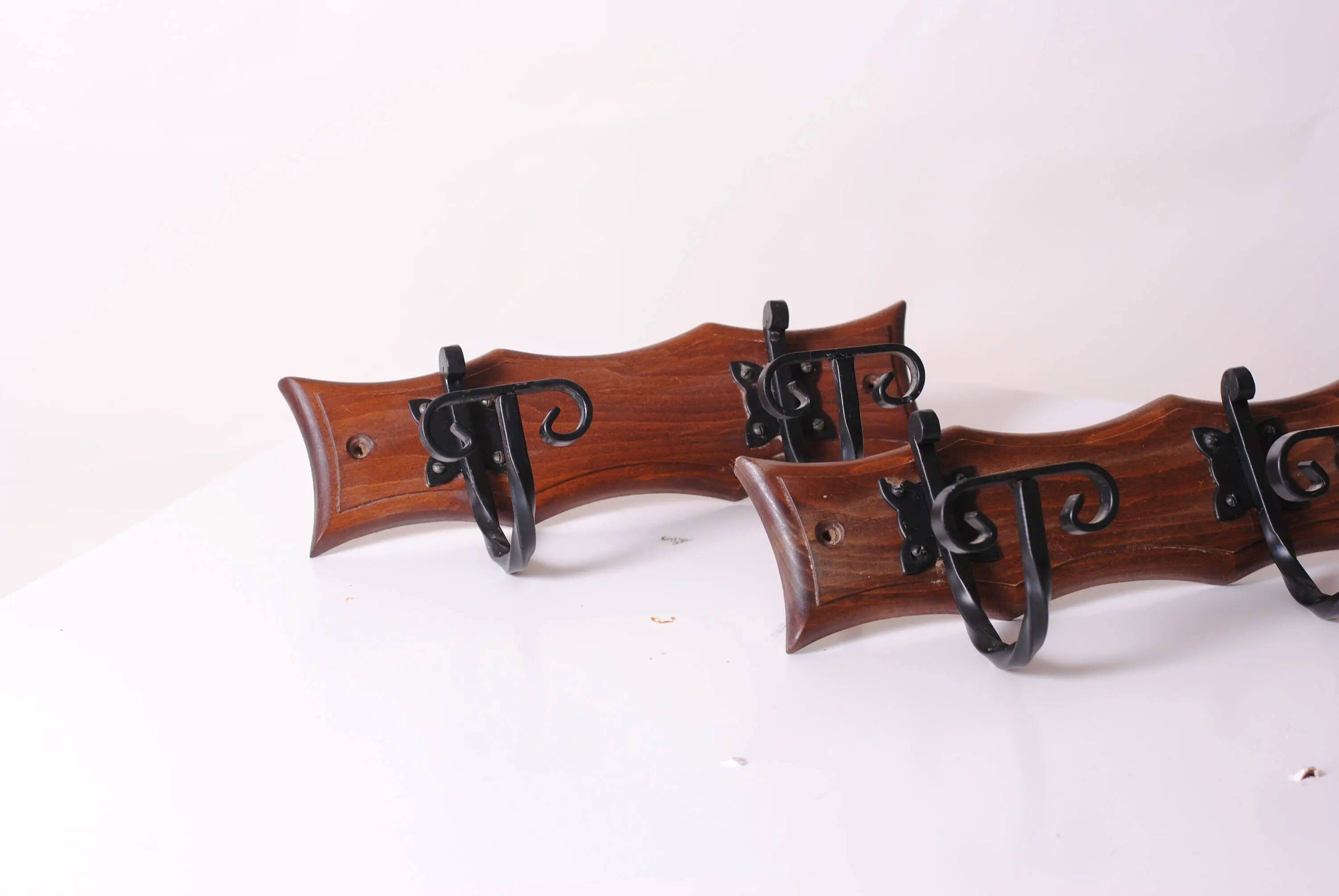 wood and wrought iron coat racks, set of two