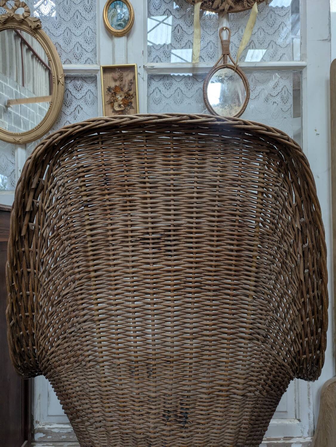 Large woven rattan armchair