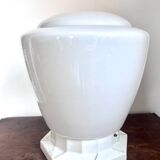 Large conical shaped glass globe with ceramic stand