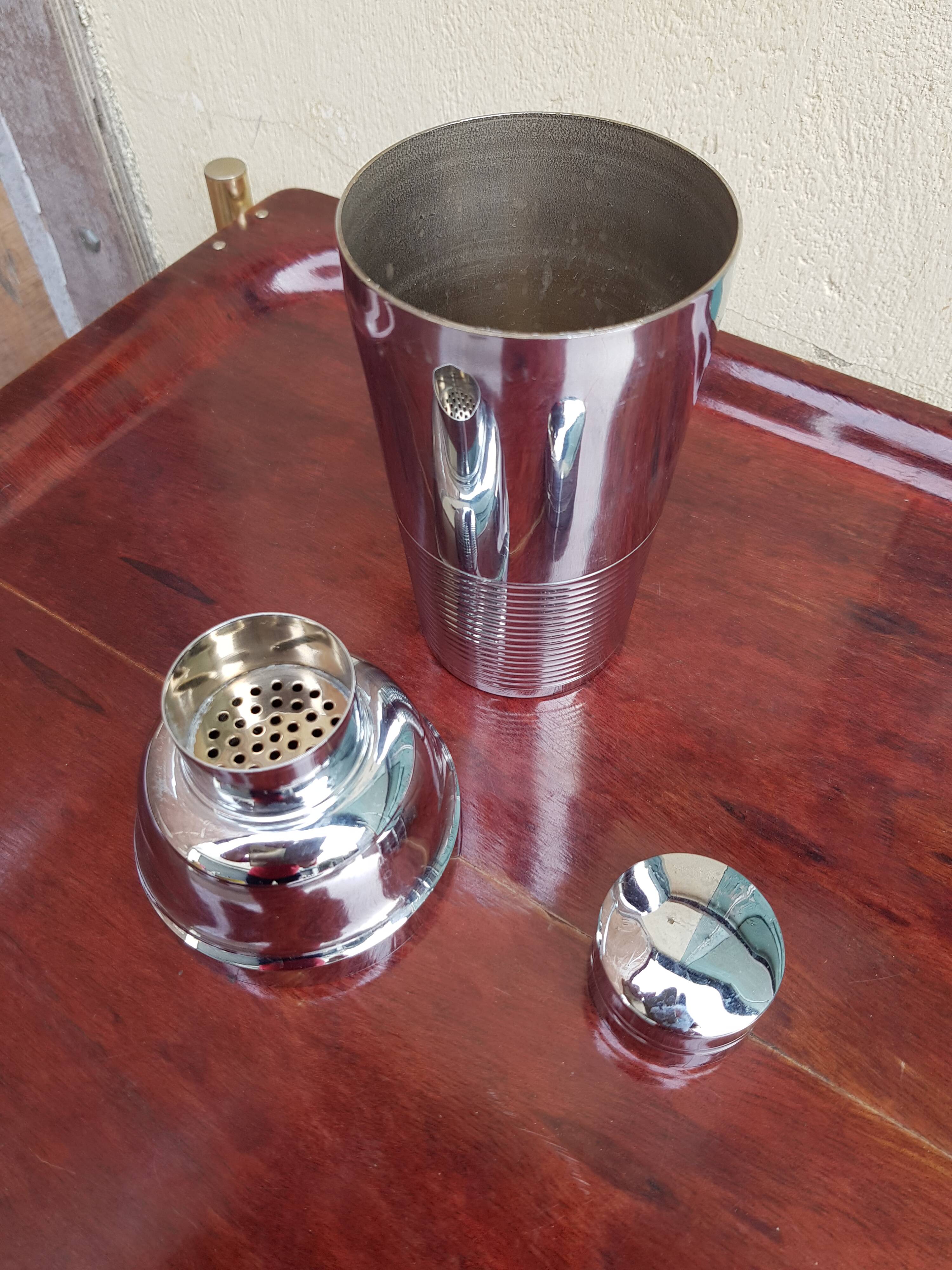 Old silver metal shaker