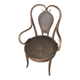 Antique curved wooden armchair with caning – Bistro style