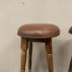 Pair of vintage stools imitation leather