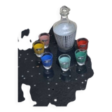 Liquor service consisting of a carafe and 6 small shot glasses, houndstooth pattern
