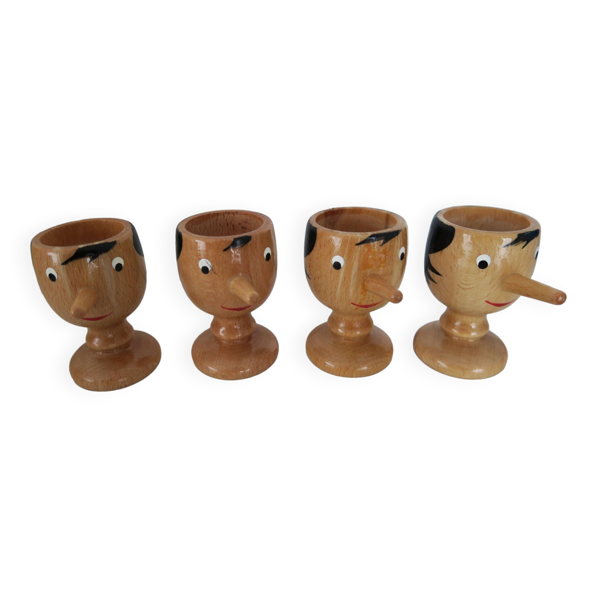 4 Pinocchio wooden egg cups Italy New