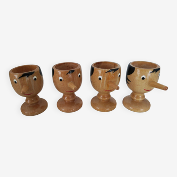 4 Pinocchio wooden egg cups Italy New