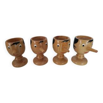 4 Pinocchio wooden egg cups Italy New