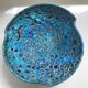 Eruptive ceramic dish from the 60s