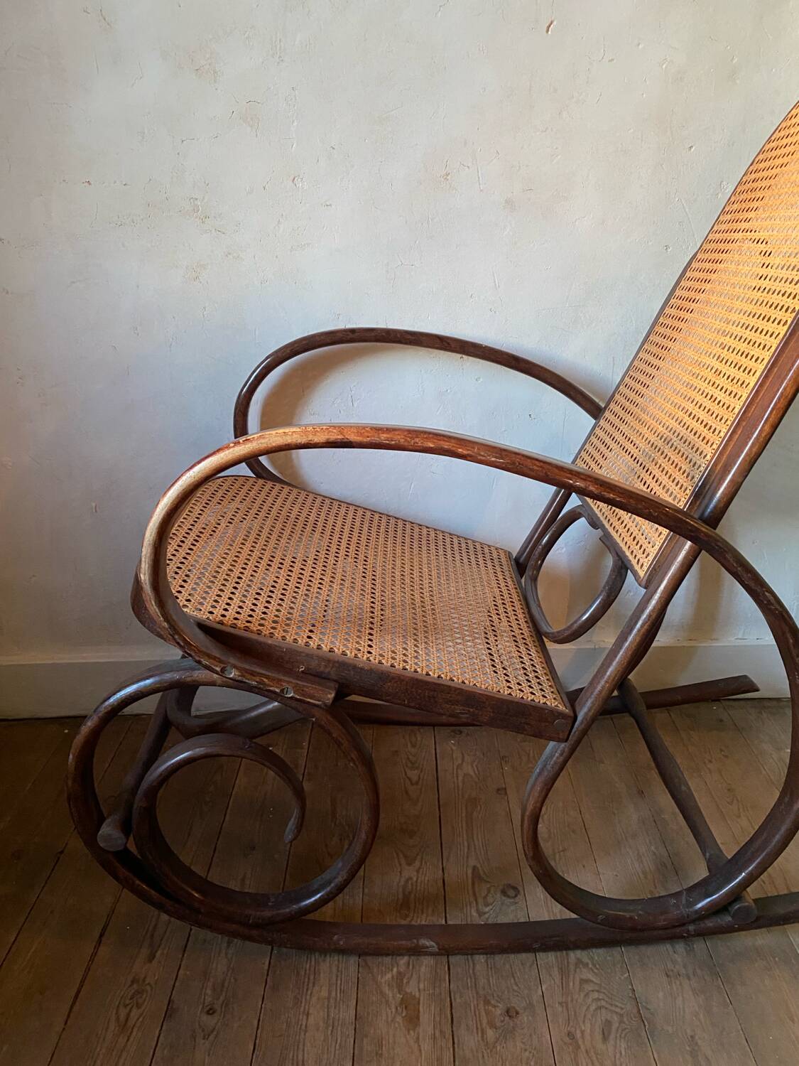 Wood and cane rocking chair