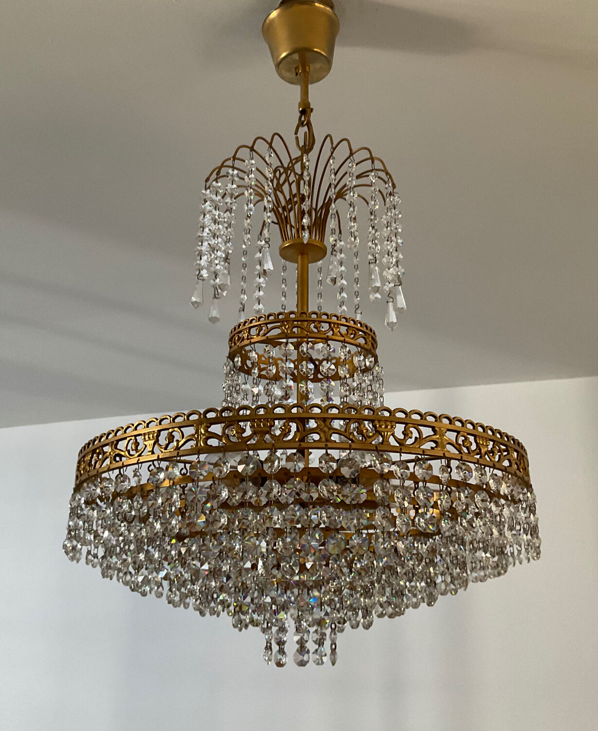 Cascade chandelier with crystal and bronze tassels