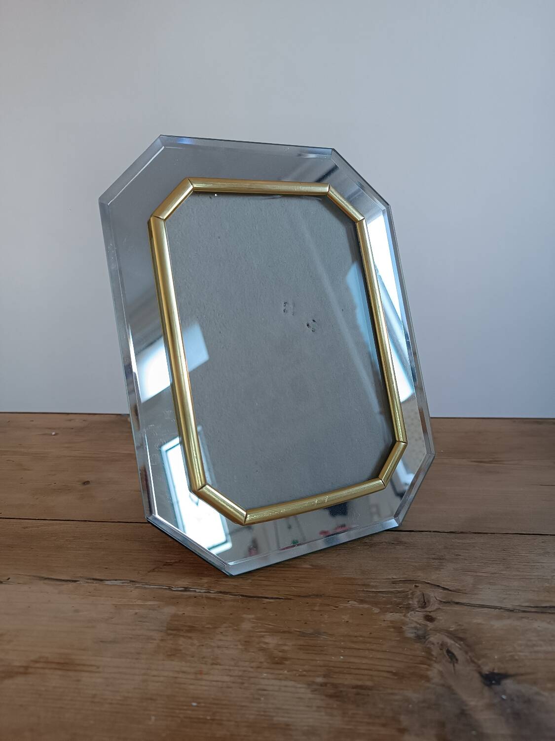 Beveled mirror frame