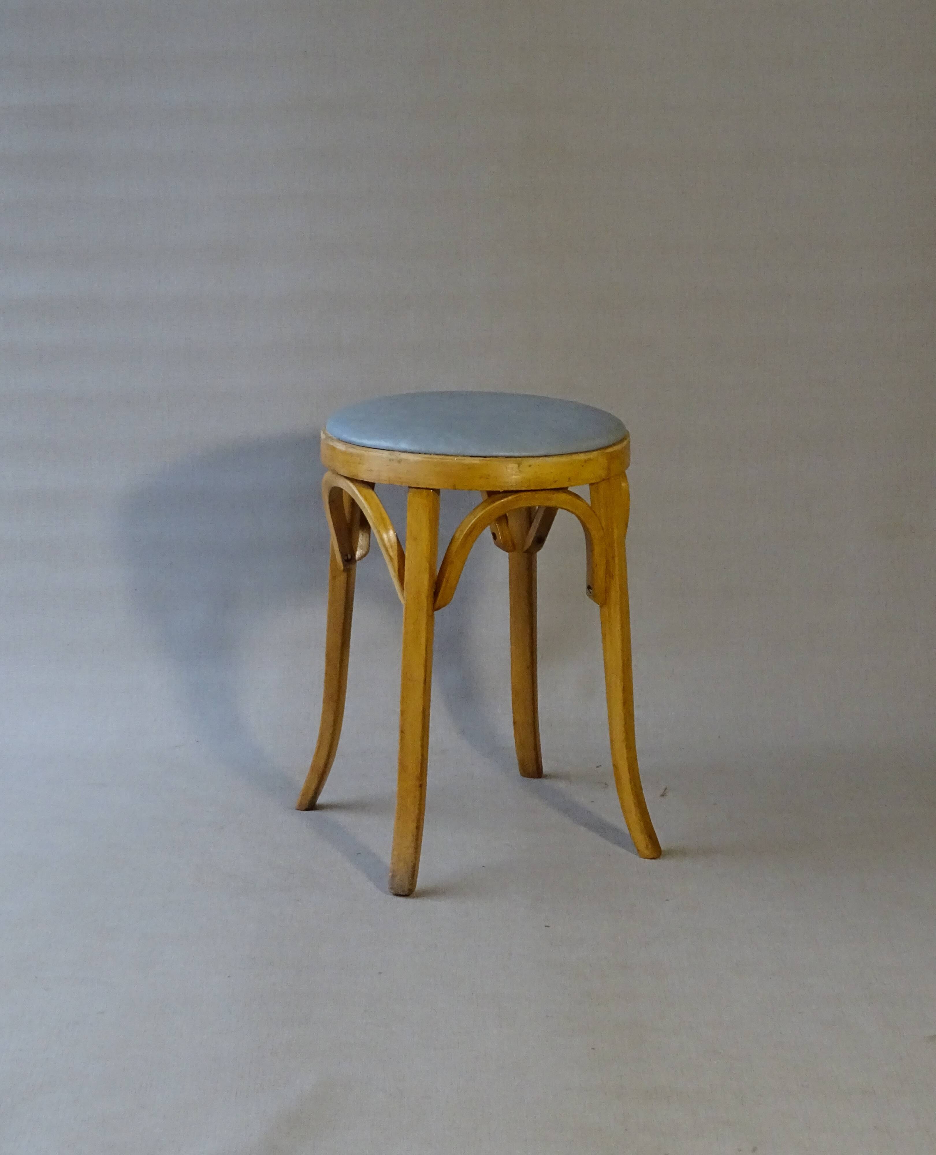 Baumann low stool, circa 1950/60, leatherette seat, curved wood