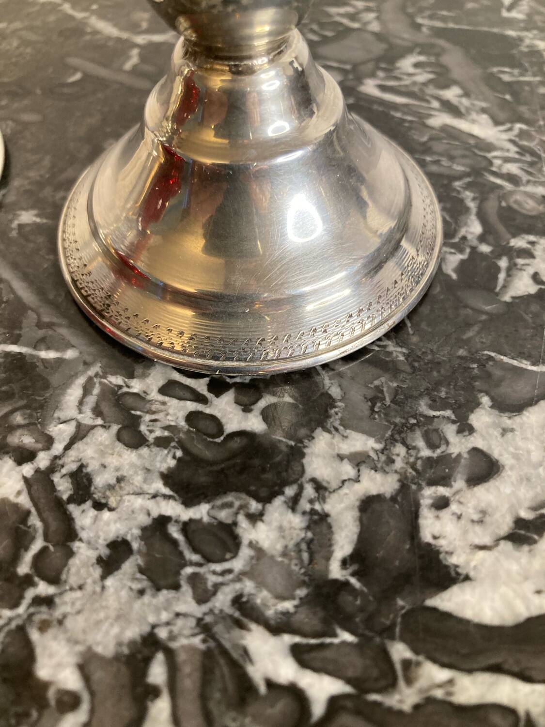 Pair of silver metal candlesticks