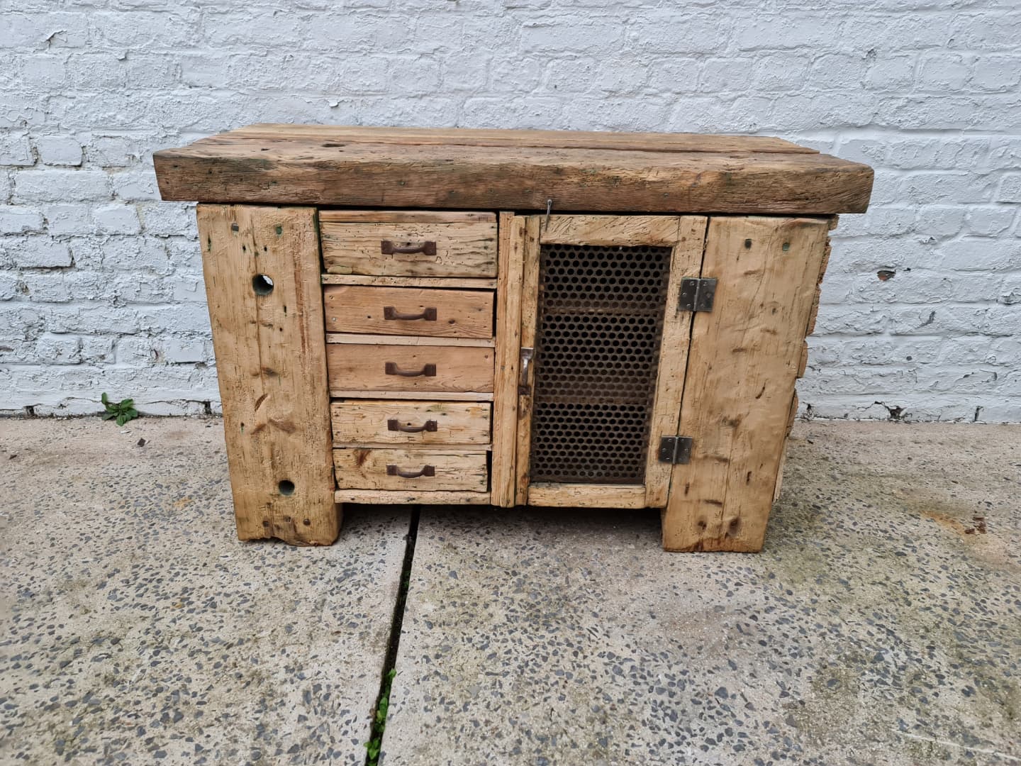 Old established a door and five drawers raw wood