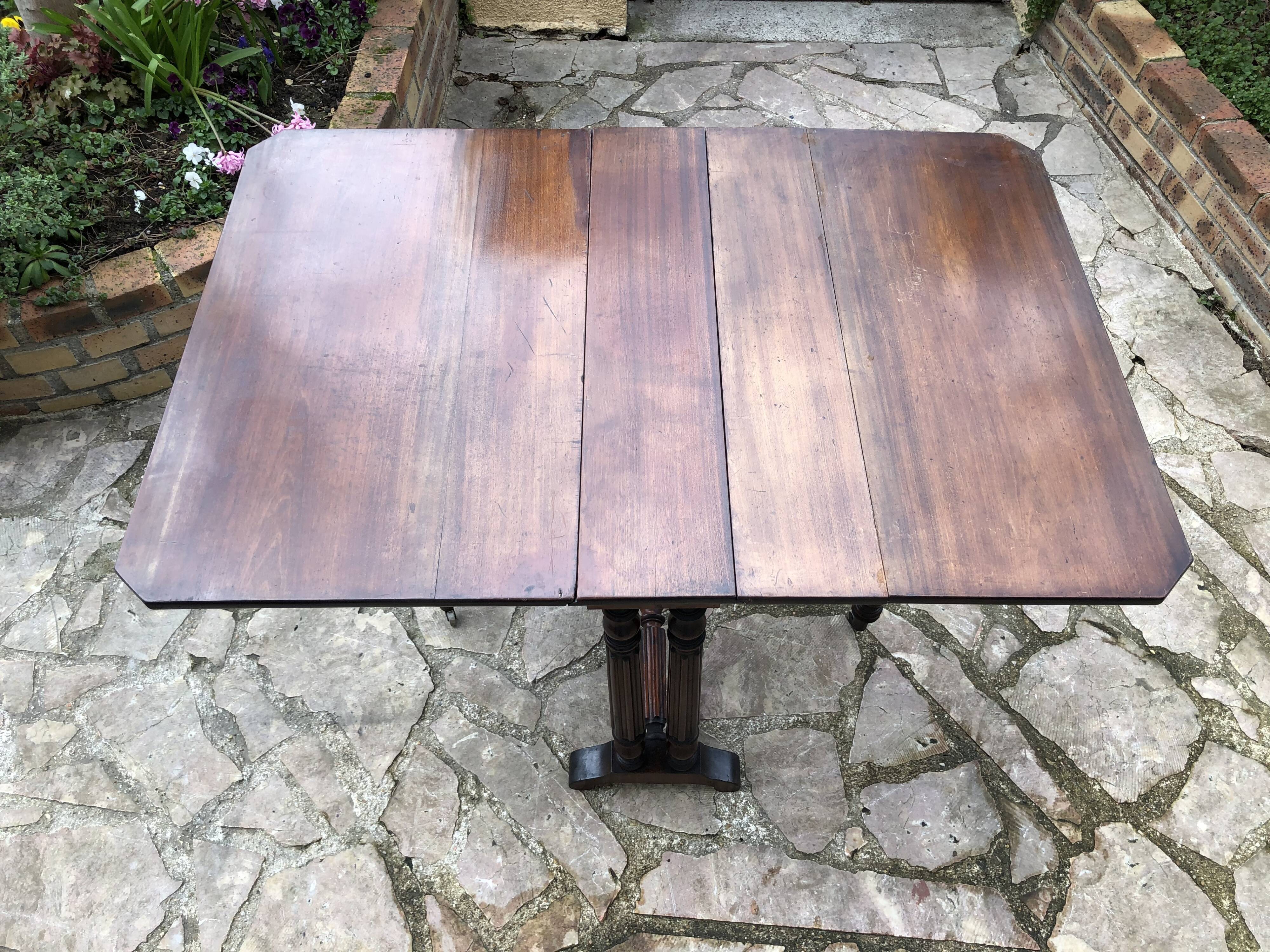 Side table with flaps