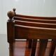 Support made of hardwood with a drawer and wheels.
