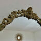 Oval mirror in gilded brass with frieze 40s 50s, 37x50 cm