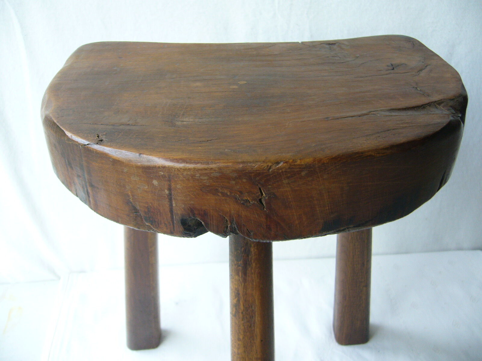 Walnut tripod cowhock stool
