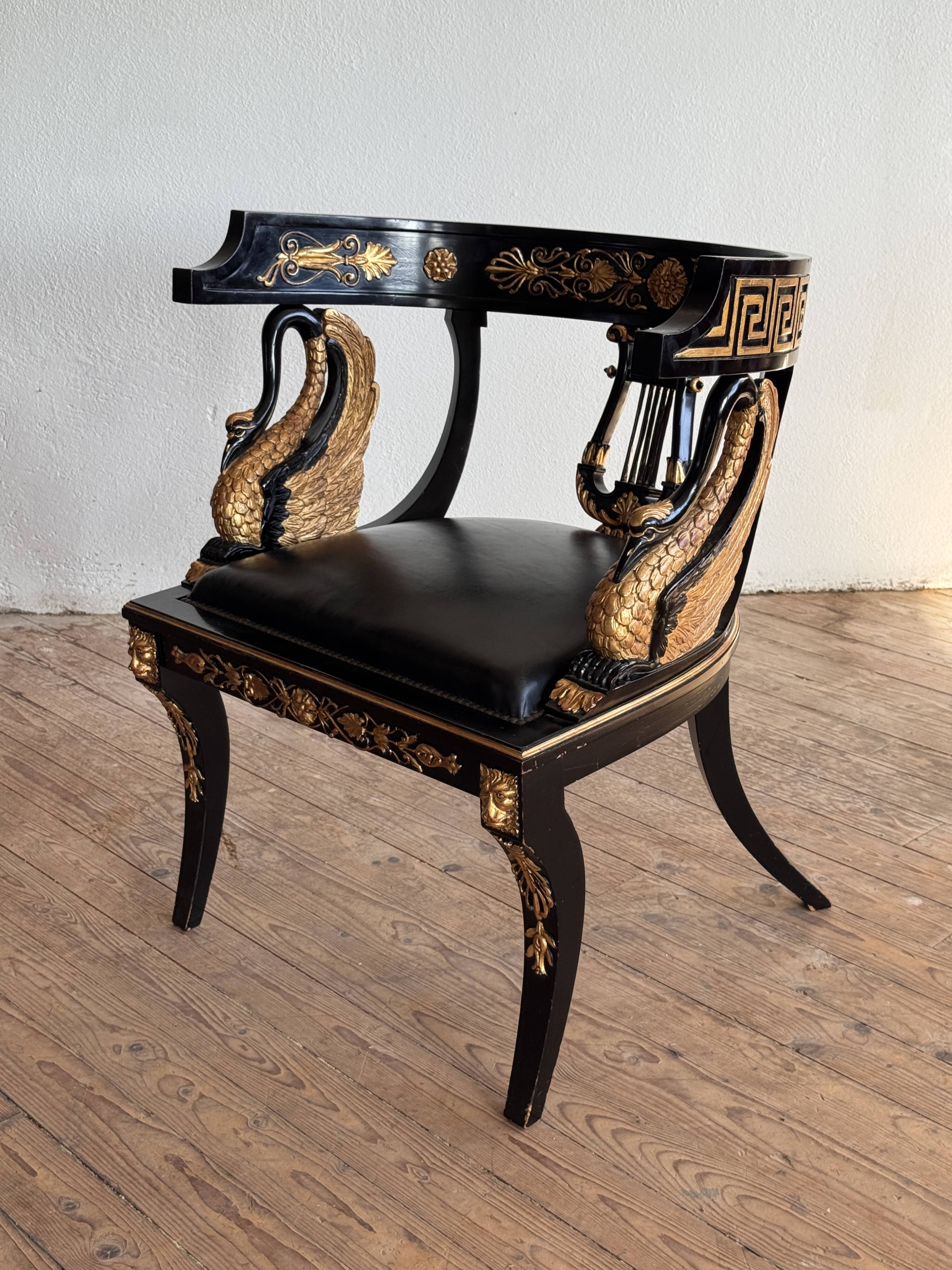 Pair of Empire-style bergère armchairs decorated with swans and lyres