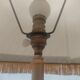 Lampadaire tripode métal doré