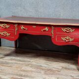 Louis XV style curved center desk in red lacquer and gilded bronze
