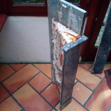 White veined black marble fireplace