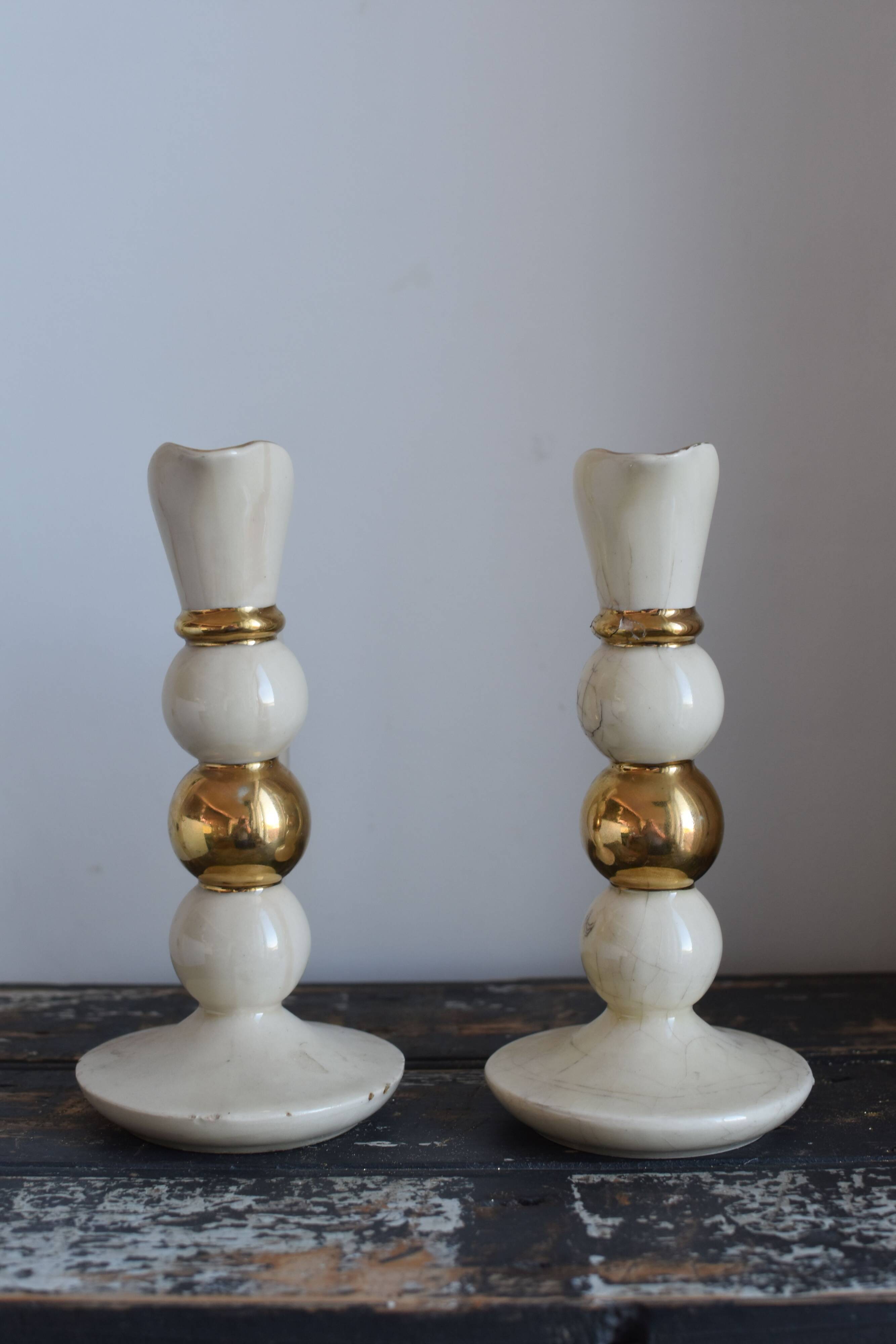 Pair of designer candle holders