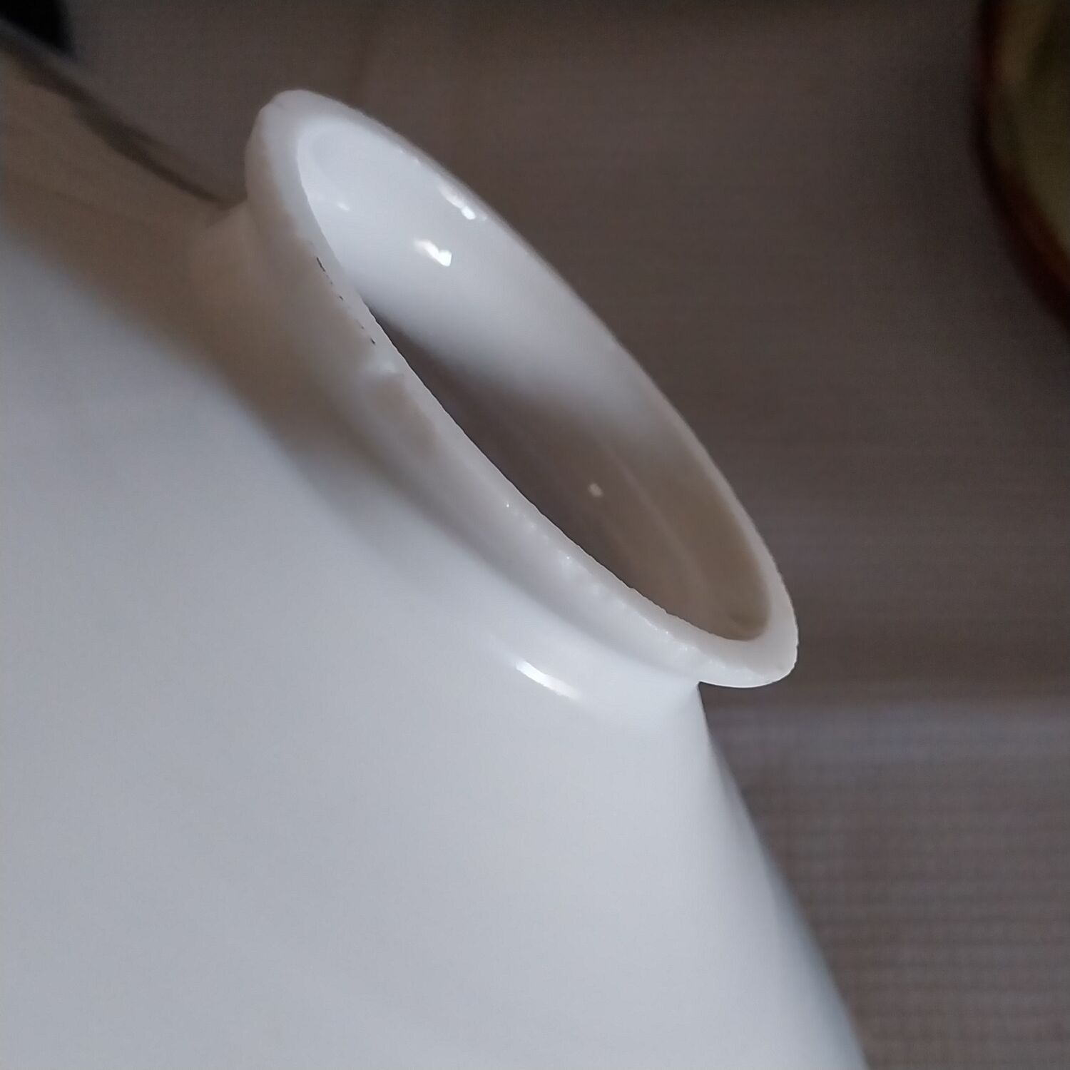 Old lace-edged conical lampshade in opaline