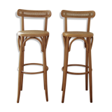 Wooden bar stools and cane