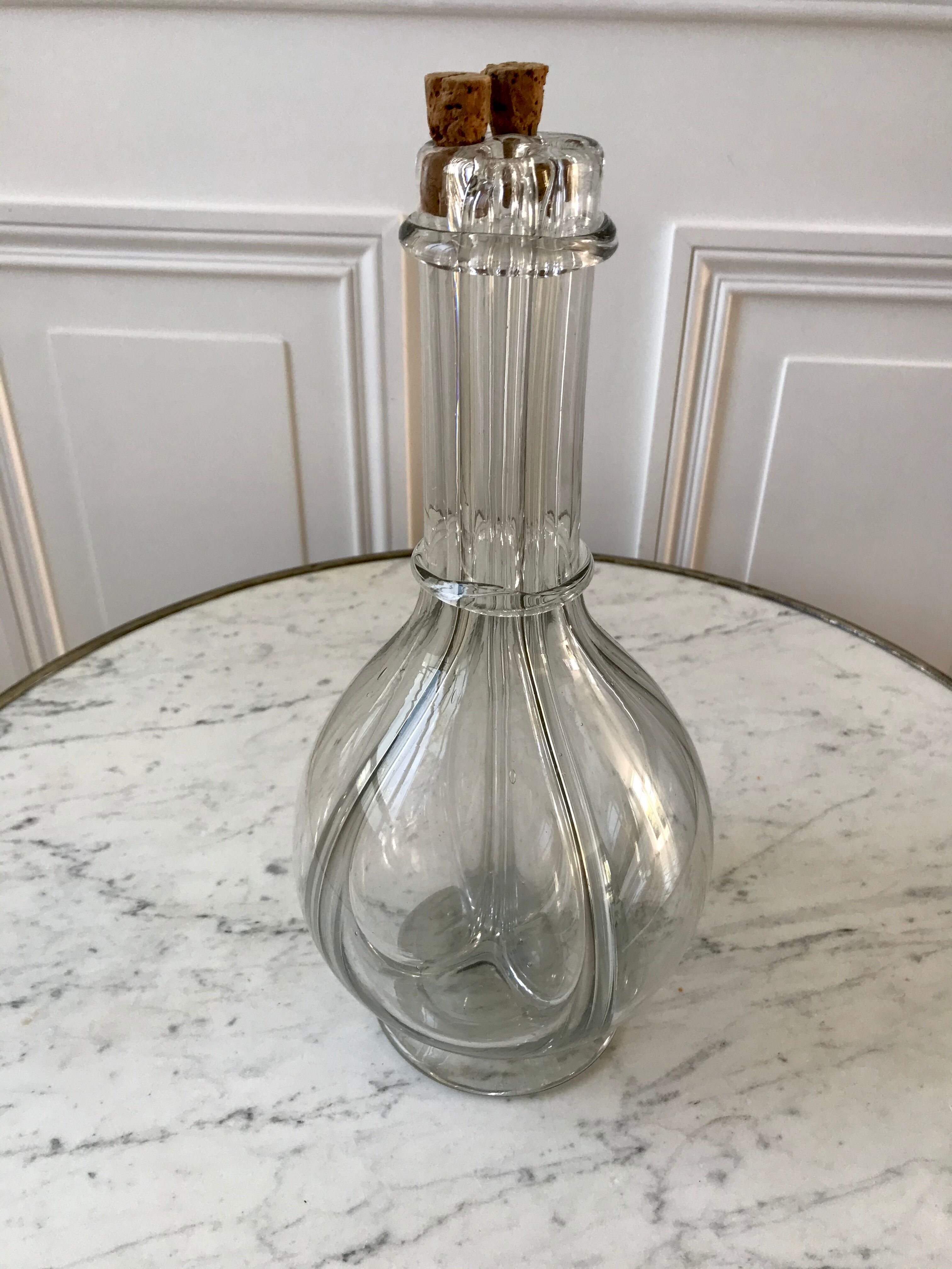 Liquor decanter with molded glass compartments early XXth